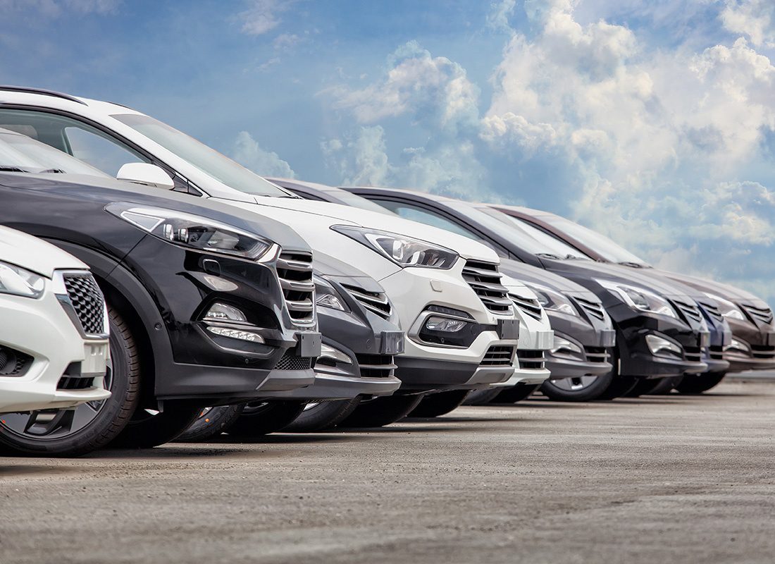 Business Insurance - Row of Black, Gray and White Cars on a Lot